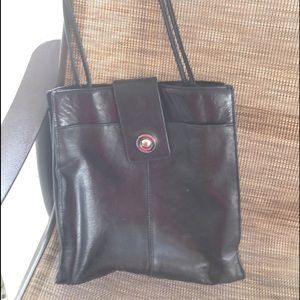 Wilson’s leather black handbag.